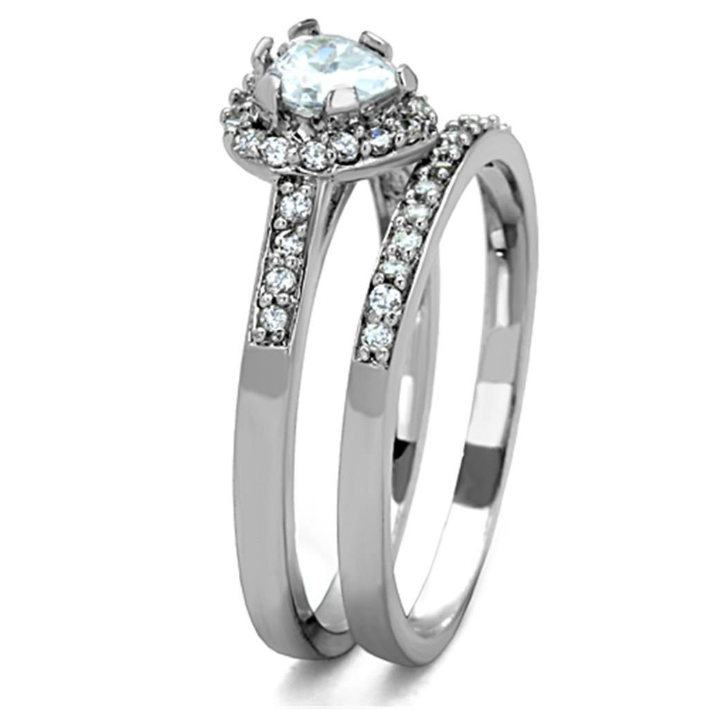 High polished stainless steel ring featuring a clear AAA grade cubic zirconia center stone, showcasing elegance and shine.