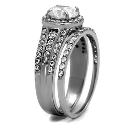 High polished stainless steel ring featuring a clear AAA grade cubic zirconia center stone, showcasing a sleek and elegant design.