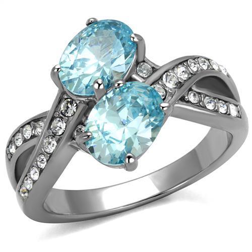 TK2501 High Polished Stainless Steel Ring featuring a vibrant AAA Grade Sea Blue CZ stone, showcasing its elegant design and shine.