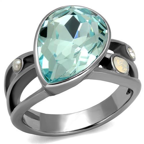 TK2502 High Polished Stainless Steel Ring featuring a stunning sea blue top grade crystal at the center, showcasing a sleek and modern design.