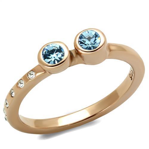 TK2807 IP Rose Gold Stainless Steel Ring featuring a sea blue top grade crystal, showcasing elegance and durability.