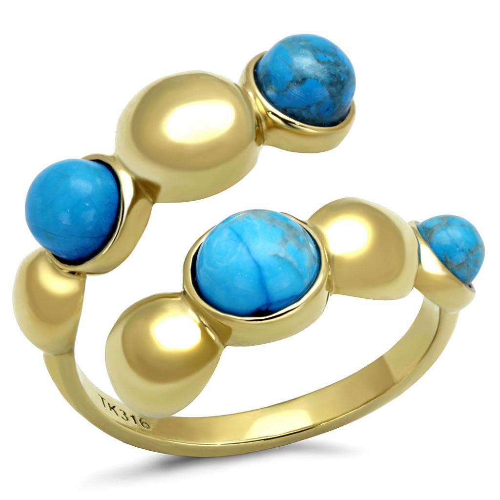 TK3091 IP Gold Stainless Steel Ring featuring a vibrant sea blue turquoise stone, showcasing elegance and durability.