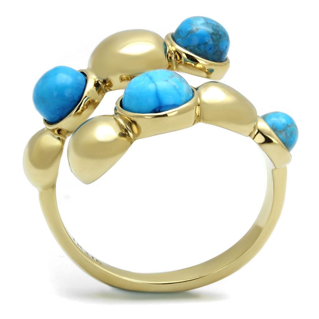 TK3091 IP Gold Stainless Steel Ring featuring a vibrant sea blue turquoise stone, showcasing elegance and durability.