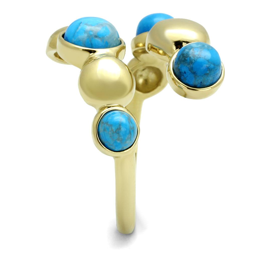 TK3091 IP Gold Stainless Steel Ring featuring a vibrant sea blue turquoise stone, showcasing elegance and durability.