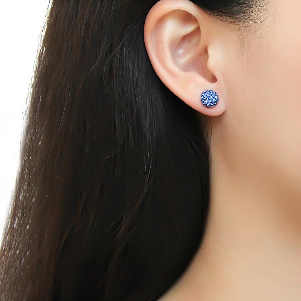 TK3550 High Polished Stainless Steel Earrings featuring sapphire crystals, showcasing a sleek and elegant design.