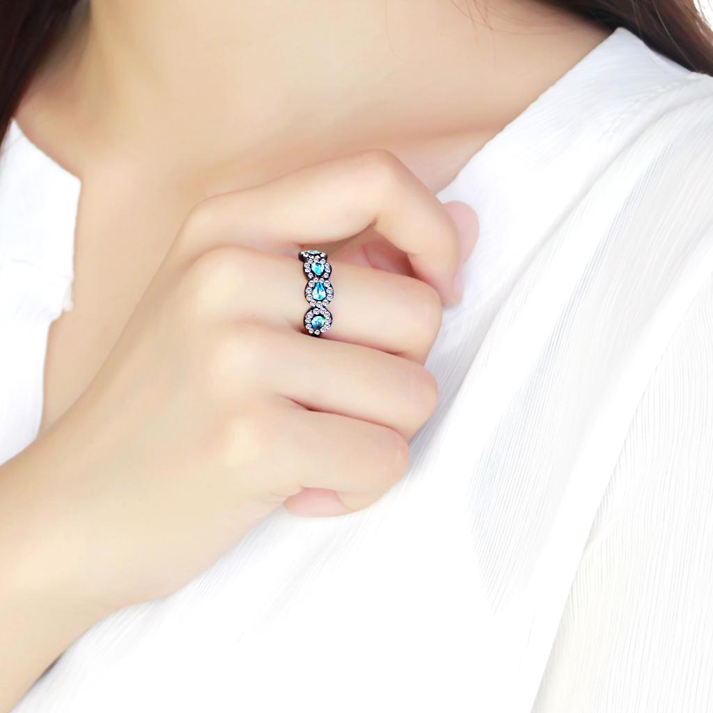 TK3559 IP Black Stainless Steel Ring featuring a AAA Grade CZ stone in sea blue, showcasing its elegant design and modern finish.