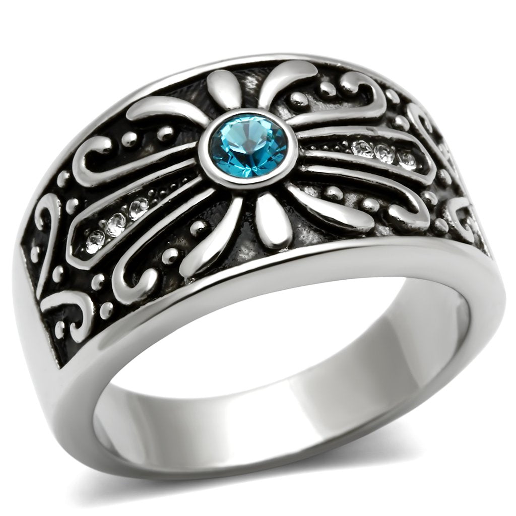 Silver ring with blue gemstone.