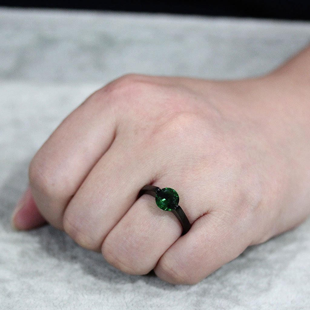 TK3738 IP Black Stainless Steel Ring featuring a vibrant synthetic emerald stone, showcasing a sleek and modern design.