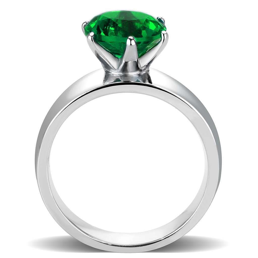 High polished stainless steel ring featuring a synthetic emerald glass stone, showcasing a sleek and elegant design.