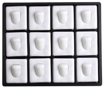 A stackable plastic tray with white pads designed to hold 12 rings, featuring a lattice pattern for elegant jewelry display.