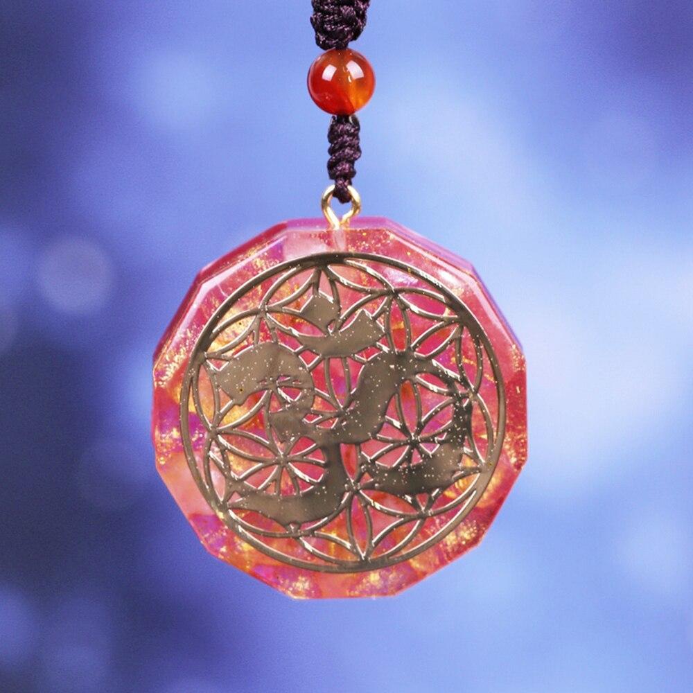 Tree Of Life Orgonite Necklace featuring a geometric pendant made of white crystal and resin, hung on a rope chain.