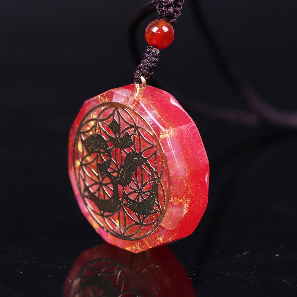 Tree Of Life Orgonite Necklace featuring a geometric pendant made of white crystal and resin, hung on a rope chain.