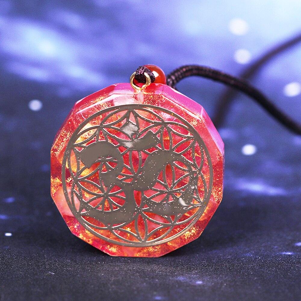 Tree Of Life Orgonite Necklace featuring a geometric pendant made of white crystal and resin, hung on a rope chain.