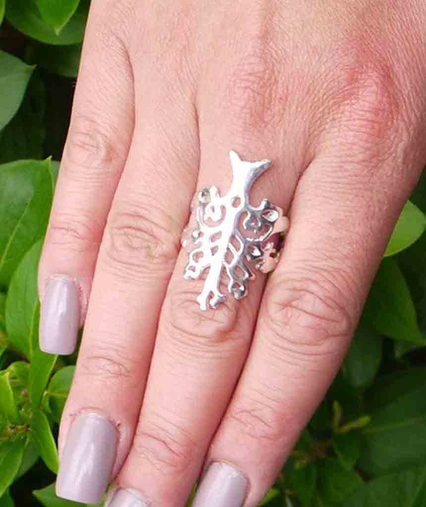 A beautifully crafted Tree of Life Ring featuring an intricate tree medallion design, made from hypoallergenic brass and silver.