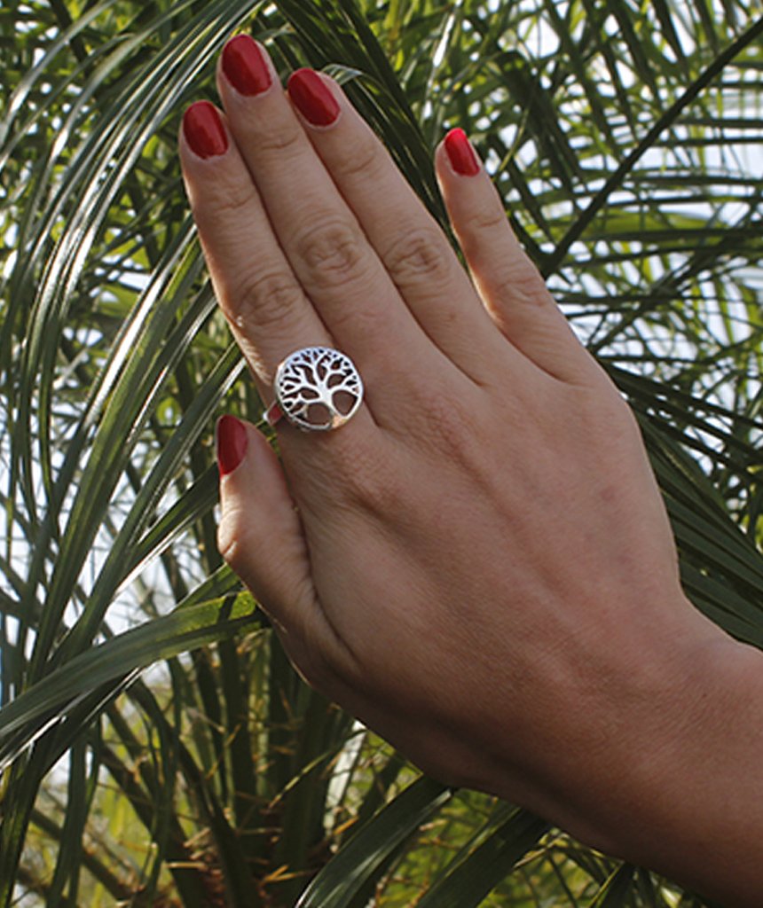 Tree of Life Ring featuring an intricate tree medallion, available in gold and silver, designed for nature lovers.