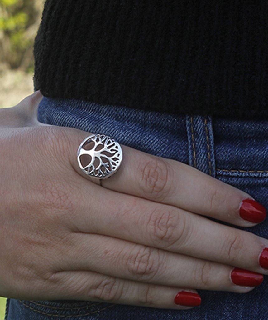 Tree of Life Ring featuring an intricate tree medallion, available in gold and silver, designed for nature lovers.