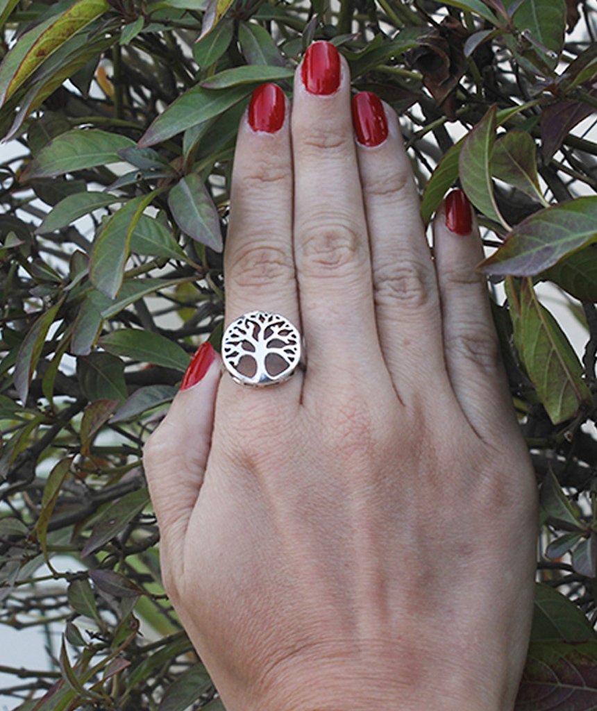 Tree of Life Ring featuring an intricate tree medallion, available in gold and silver, designed for nature lovers.