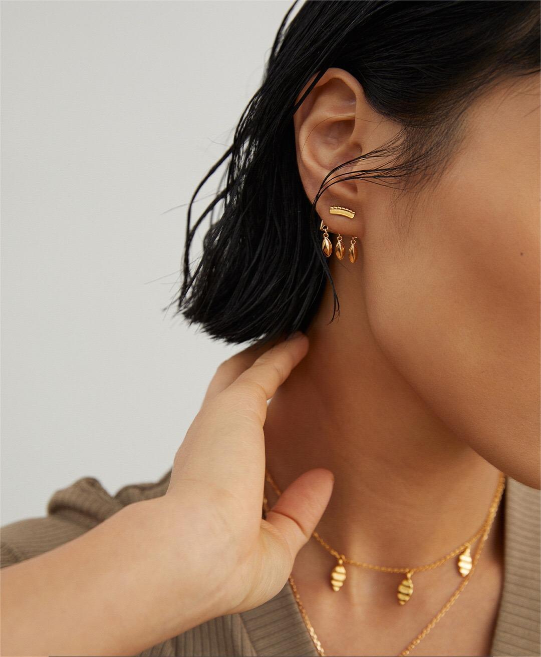 Trendy Boho Dangle Detachable Earrings made of gold vermeil, showcasing intricate design and elegance.