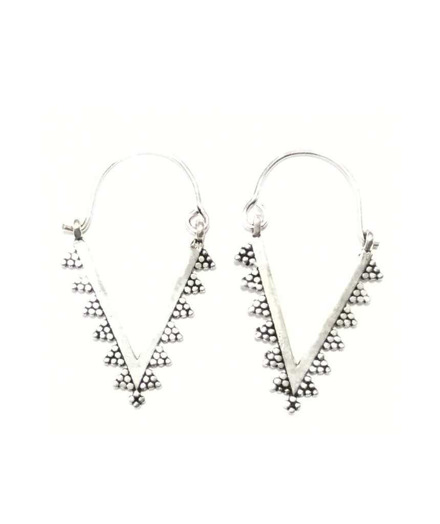 A pair of modern triangle earrings in silver and gold, showcasing a unique design suitable for various occasions.