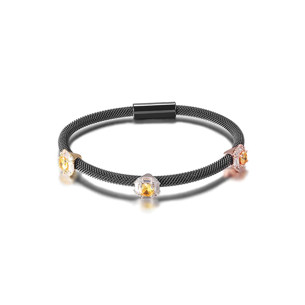 Tricolor PAVÉ Square Station Bangle made of surgical stainless steel with gold plating, showcasing its elegant design.