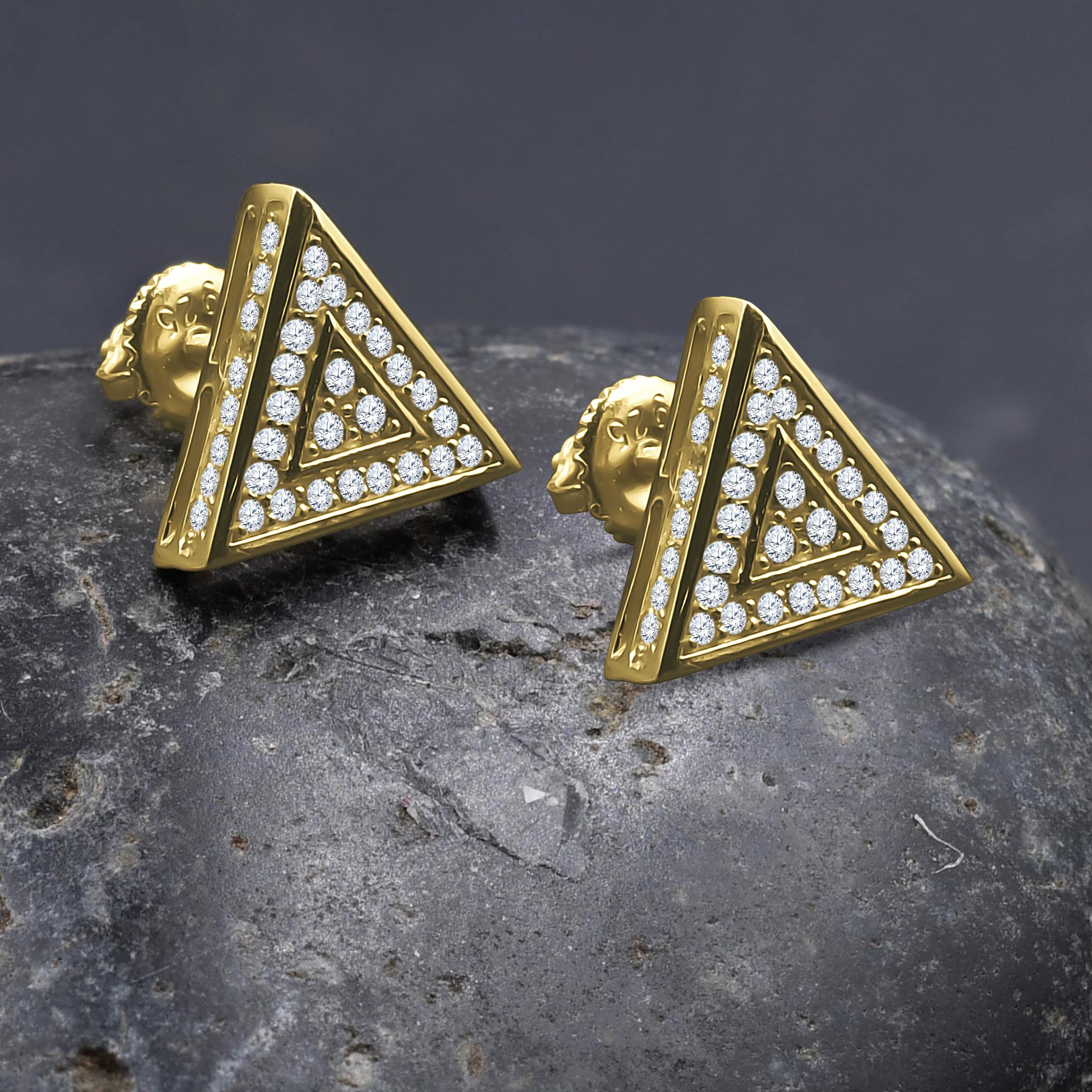 A pair of elegant Trigonal Screw Back earrings featuring sparkling cubic zircon stones set in brass copper metal.