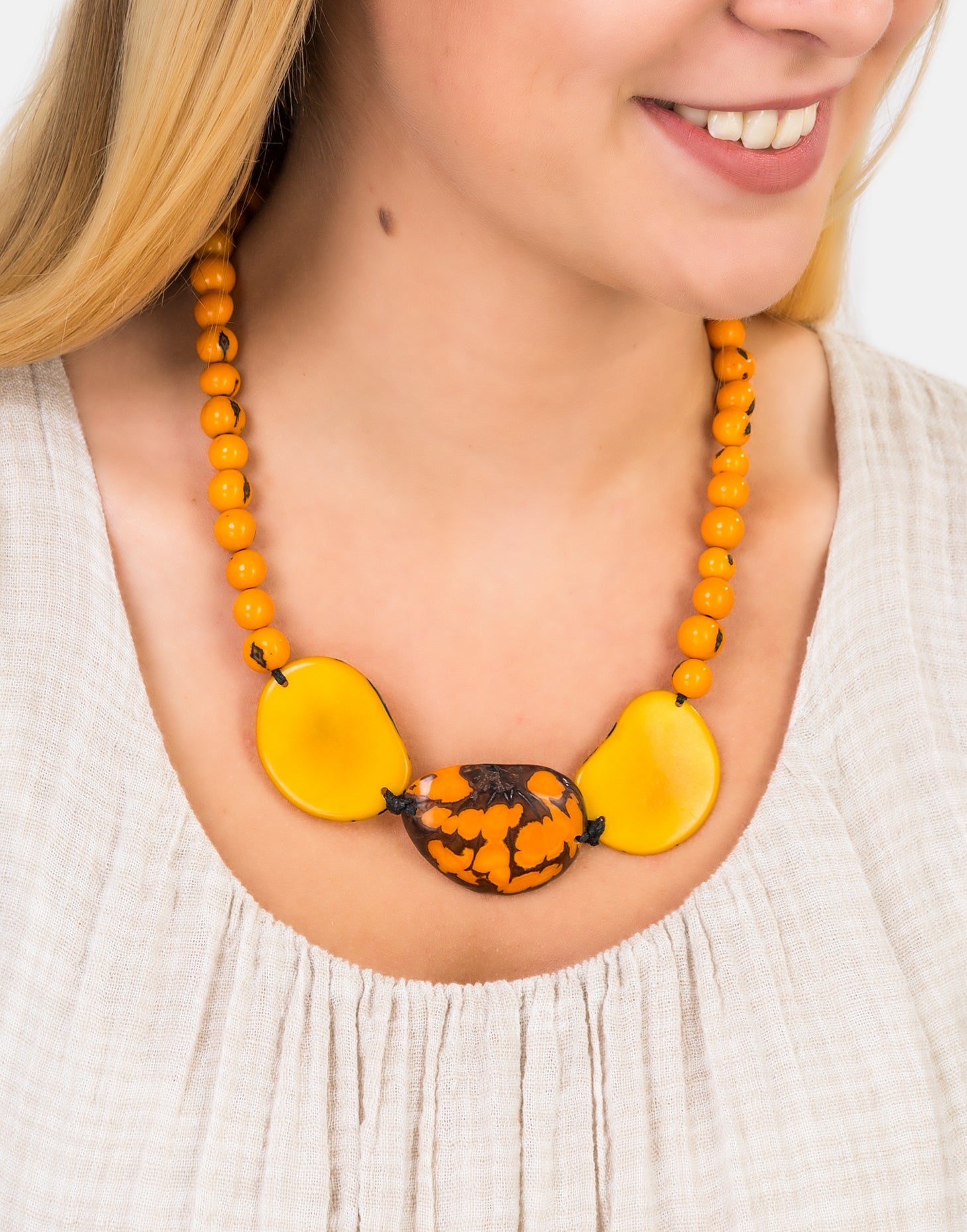 Trio Marble Slice Adjustable Necklace featuring tagua nut and acai seed slices, showcasing its unique design and adjustable macrame clasp.