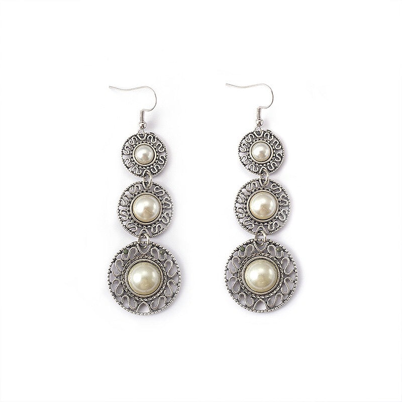 Elegant Triple Pearl Hat Earrings made of alloy, featuring three lustrous pearls in a stylish design.