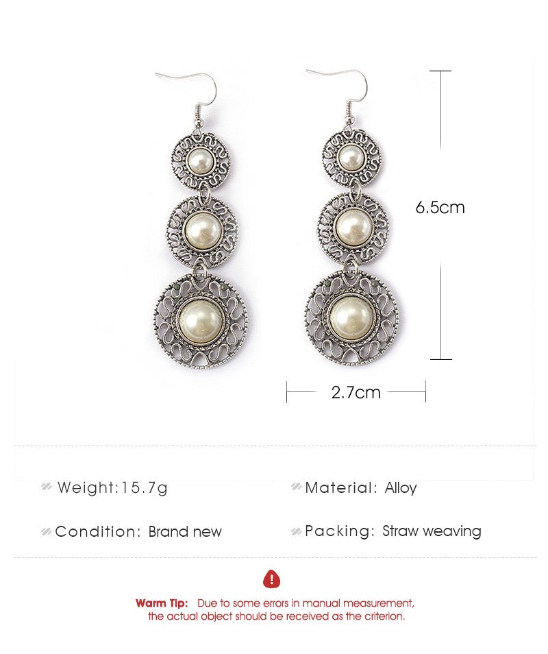 Elegant Triple Pearl Hat Earrings made of alloy, featuring three lustrous pearls in a stylish design.