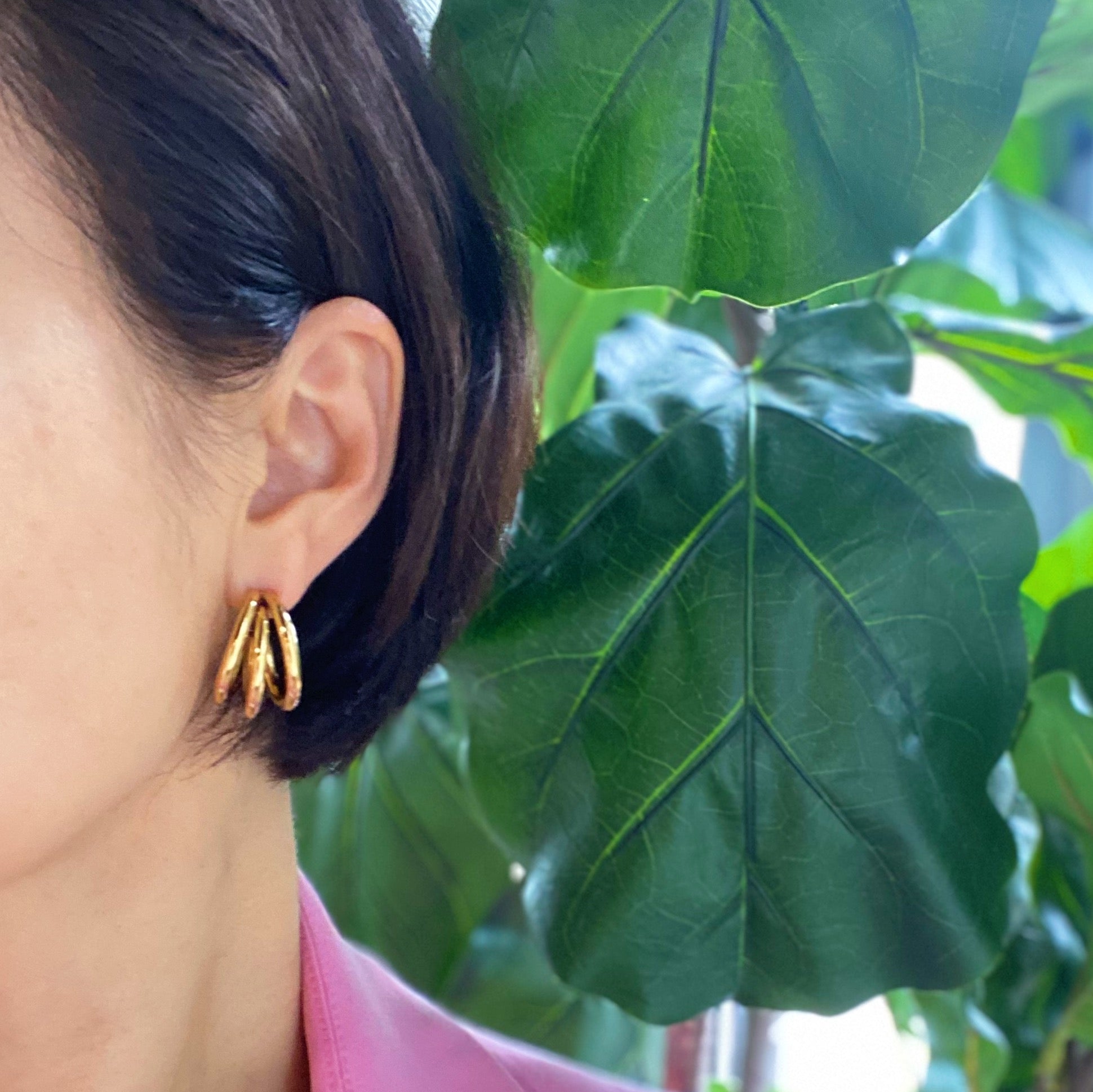 Triple hoop earrings in 18K gold plated stainless steel, showcasing a layered design perfect for any occasion.