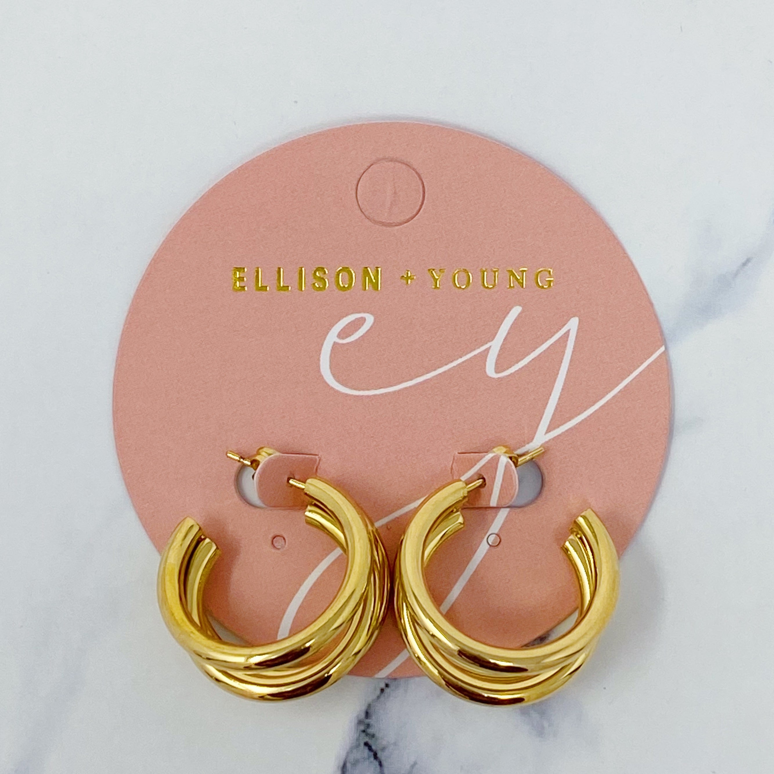 Triple hoop earrings in 18K gold plated stainless steel, showcasing a layered design perfect for any occasion.