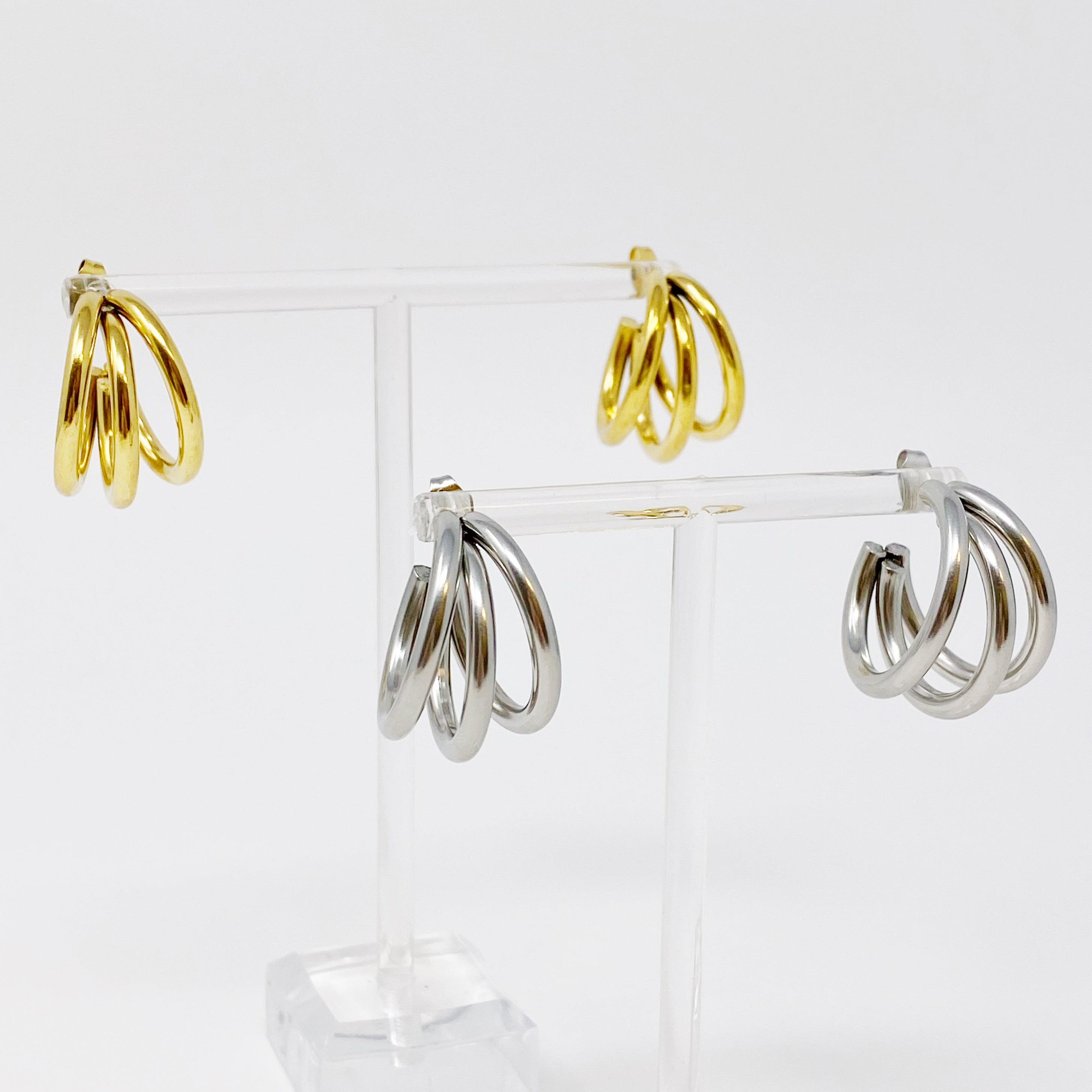 Triple hoop earrings in 18K gold plated stainless steel, showcasing a layered design perfect for any occasion.