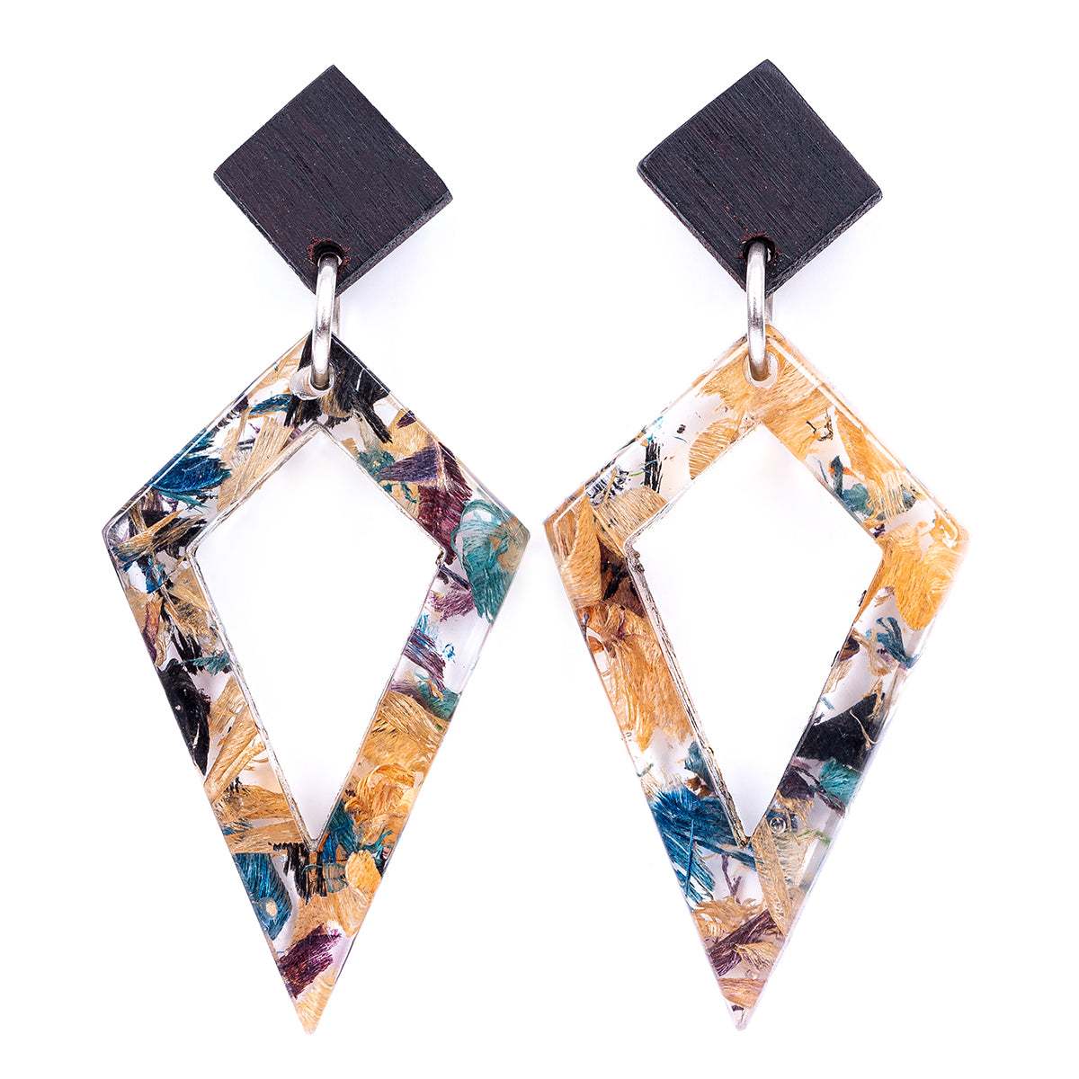 Trixie Elegant Statement Resin Earrings made from recycled skateboard wood shavings and plant resin, showcasing unique colors and patterns.