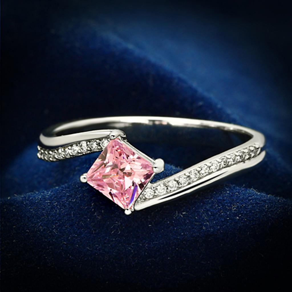 TS100 Rhodium 925 Sterling Silver Ring featuring a rose-colored AAA Grade CZ stone, showcasing its elegant design and high-quality materials.