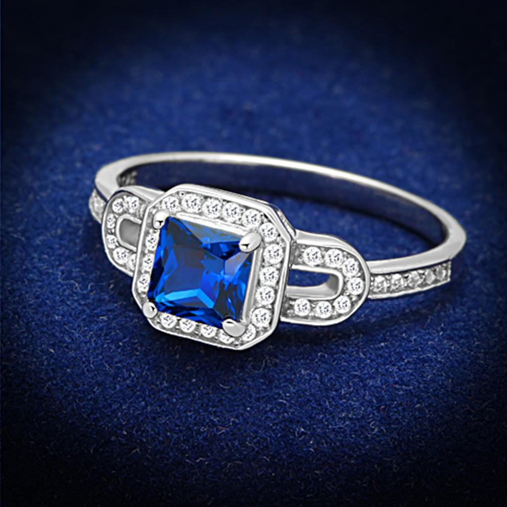 TS138 Rhodium 925 Sterling Silver Ring featuring a London Blue Synthetic Spinel, showcasing its elegant design and shiny finish.