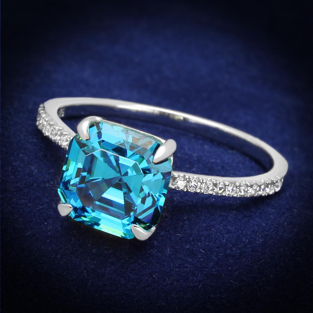 TS178 Rhodium 925 Sterling Silver Ring featuring a sea blue cubic stone, showcasing its elegant design and high-quality materials.