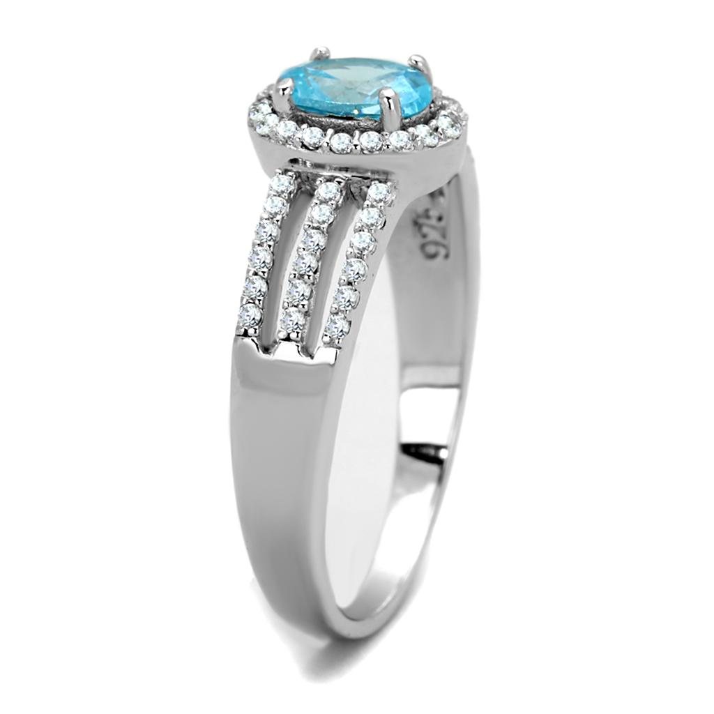 TS184 Rhodium 925 Sterling Silver Ring featuring a AAA Grade CZ in a vibrant sea blue color, elegantly designed for any occasion.