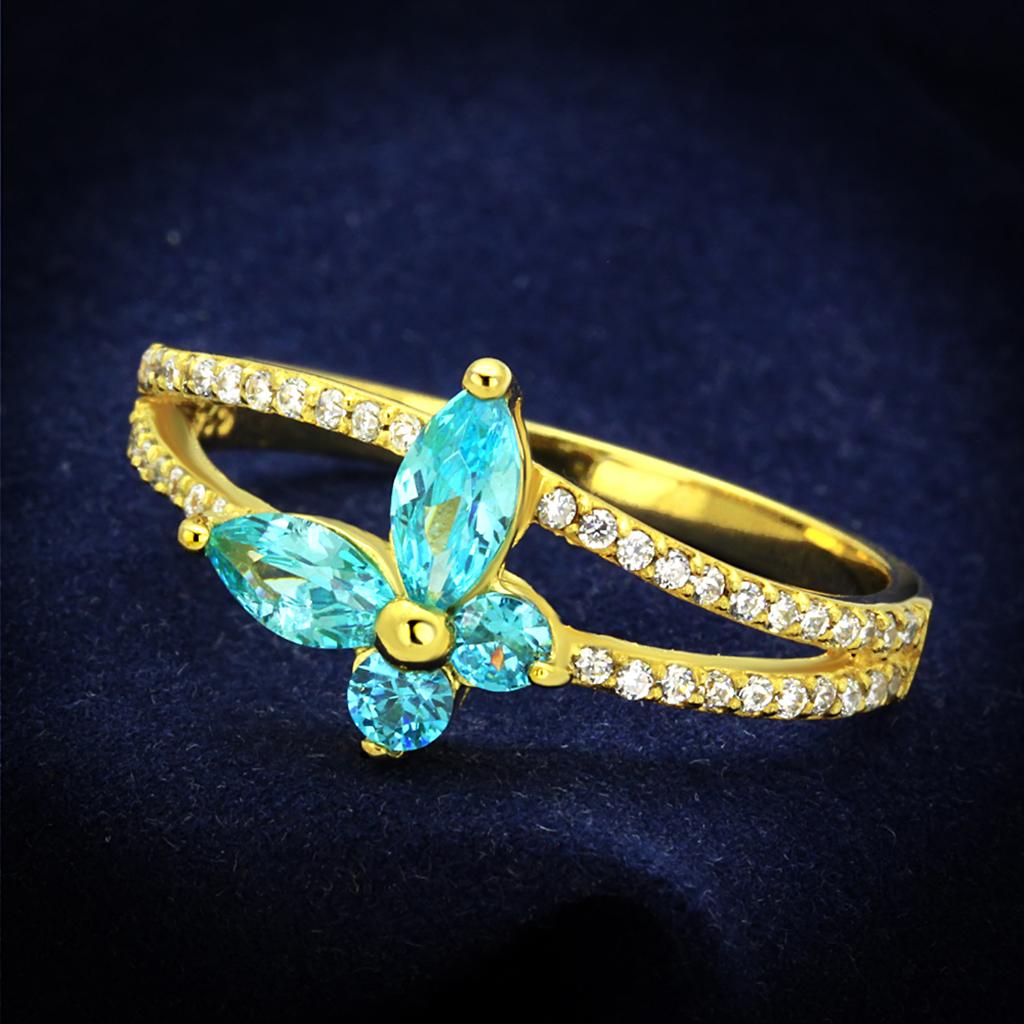 TS249 Gold 925 Sterling Silver Ring featuring a vibrant sea blue AAA Grade CZ stone, showcasing elegance and luxury.