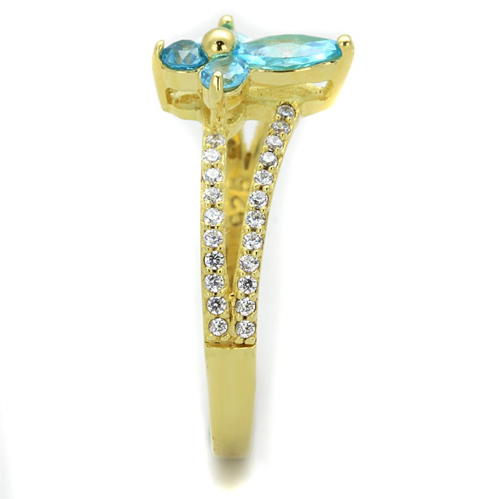 TS249 Gold 925 Sterling Silver Ring featuring a vibrant sea blue AAA Grade CZ stone, showcasing elegance and luxury.