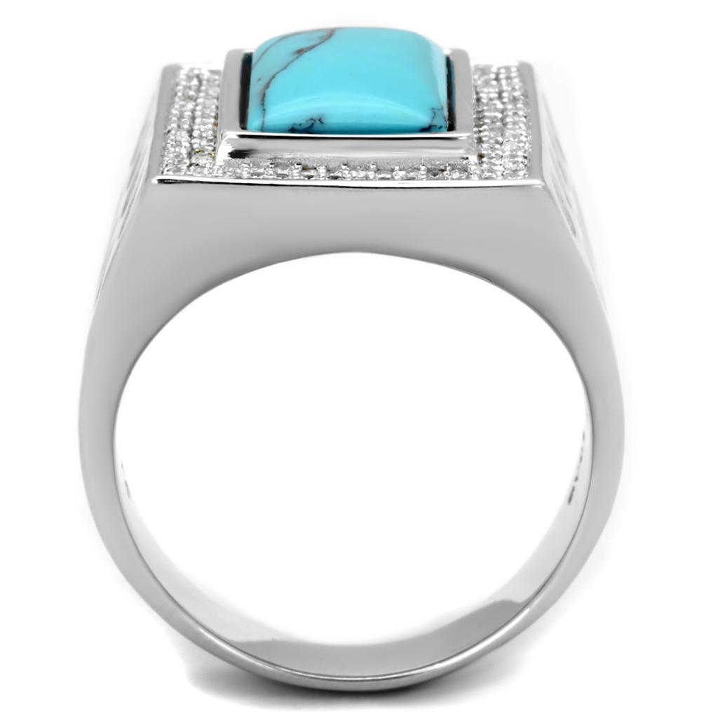 TS228 Rhodium 925 Sterling Silver Ring featuring a vibrant synthetic turquoise stone in a stylish design.