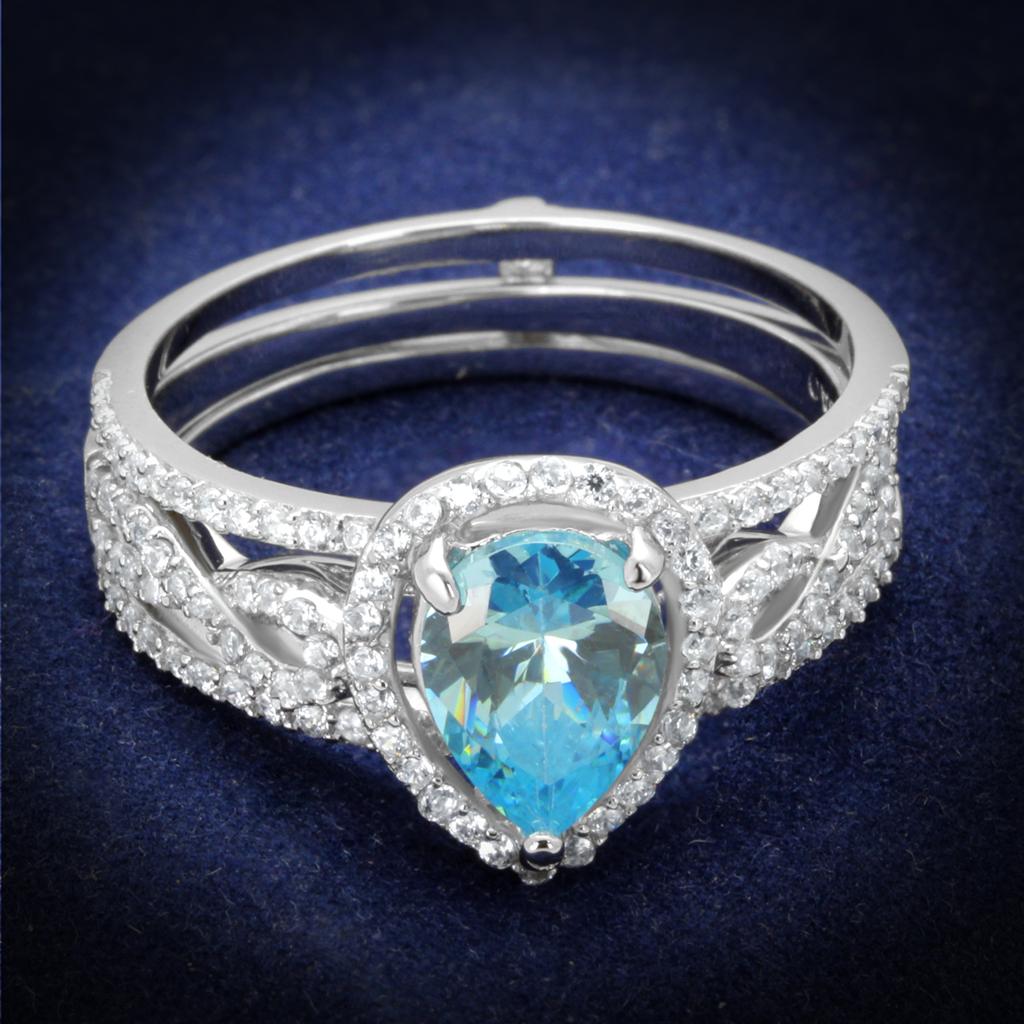 TS453 Rhodium 925 Sterling Silver Ring featuring a stunning AAA Grade CZ in sea blue, showcasing its elegant design and shine.