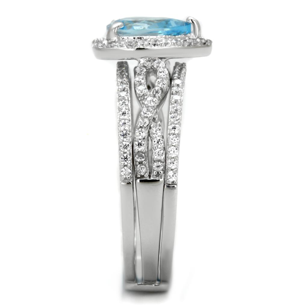 TS453 Rhodium 925 Sterling Silver Ring featuring a stunning AAA Grade CZ in sea blue, showcasing its elegant design and shine.