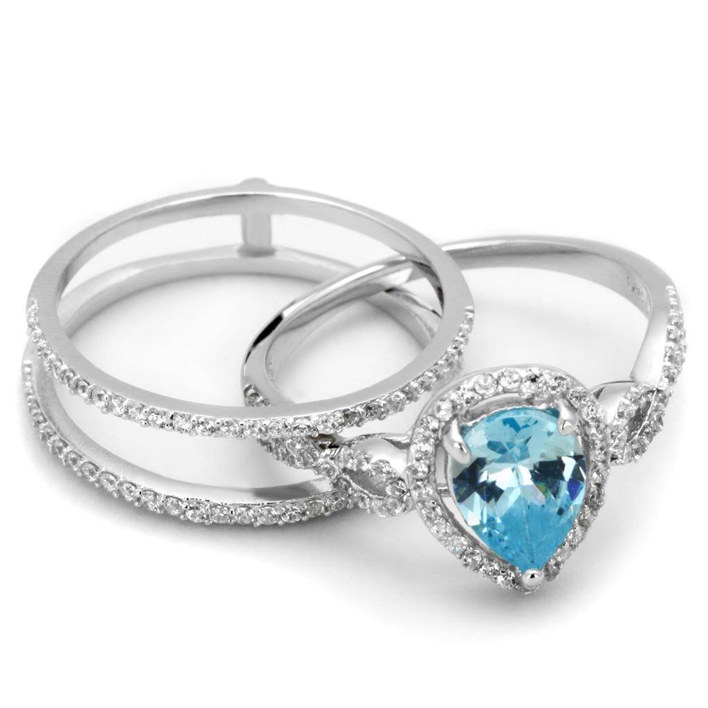 TS453 Rhodium 925 Sterling Silver Ring featuring a stunning AAA Grade CZ in sea blue, showcasing its elegant design and shine.