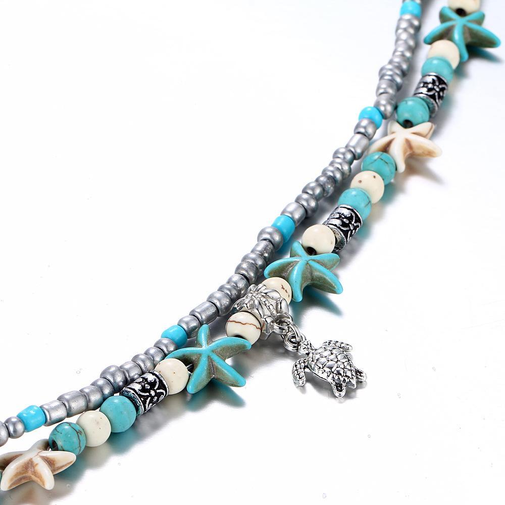 Turquoise Turtle Bohemian Ankle Bracelet in 18K white gold plating, showcasing a unique turtle design.