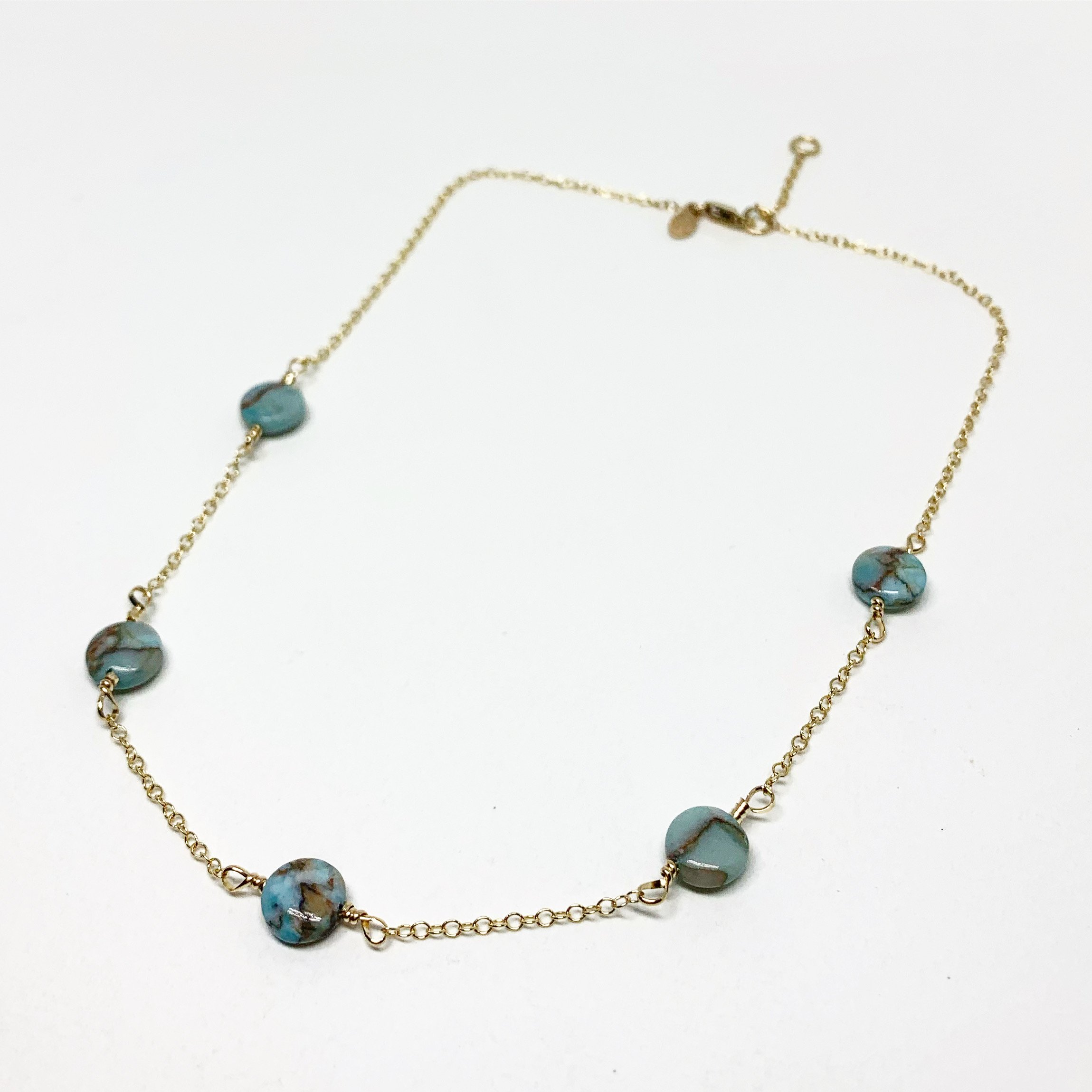 Turquoise Disc Choker Necklace featuring five 8mm turquoise round discs on a delicate chain, available in sterling silver or yellow gold fill.