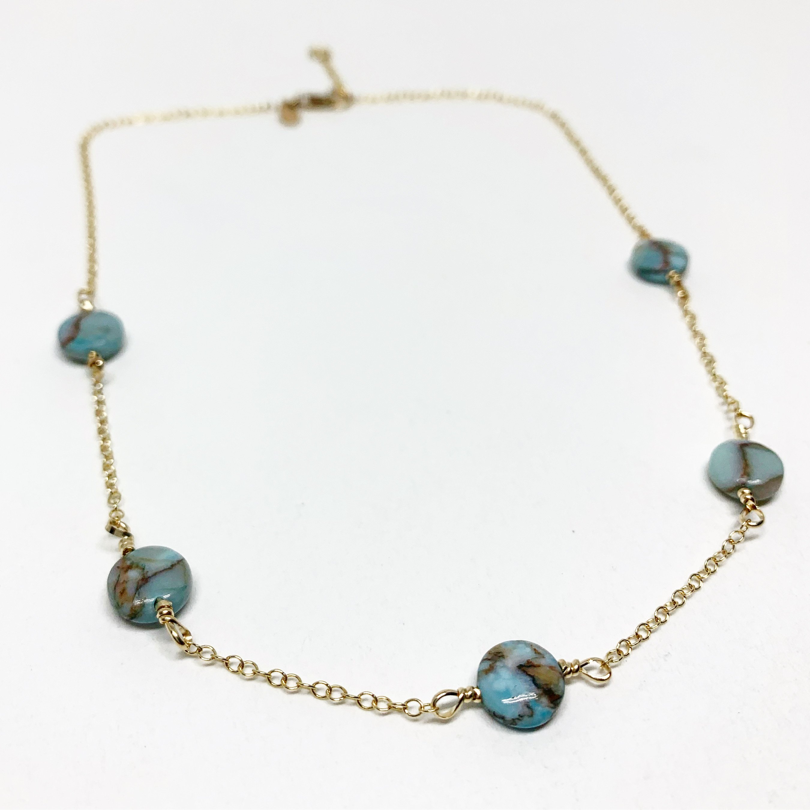 Turquoise Disc Choker Necklace featuring five 8mm turquoise round discs on a delicate chain, available in sterling silver or yellow gold fill.