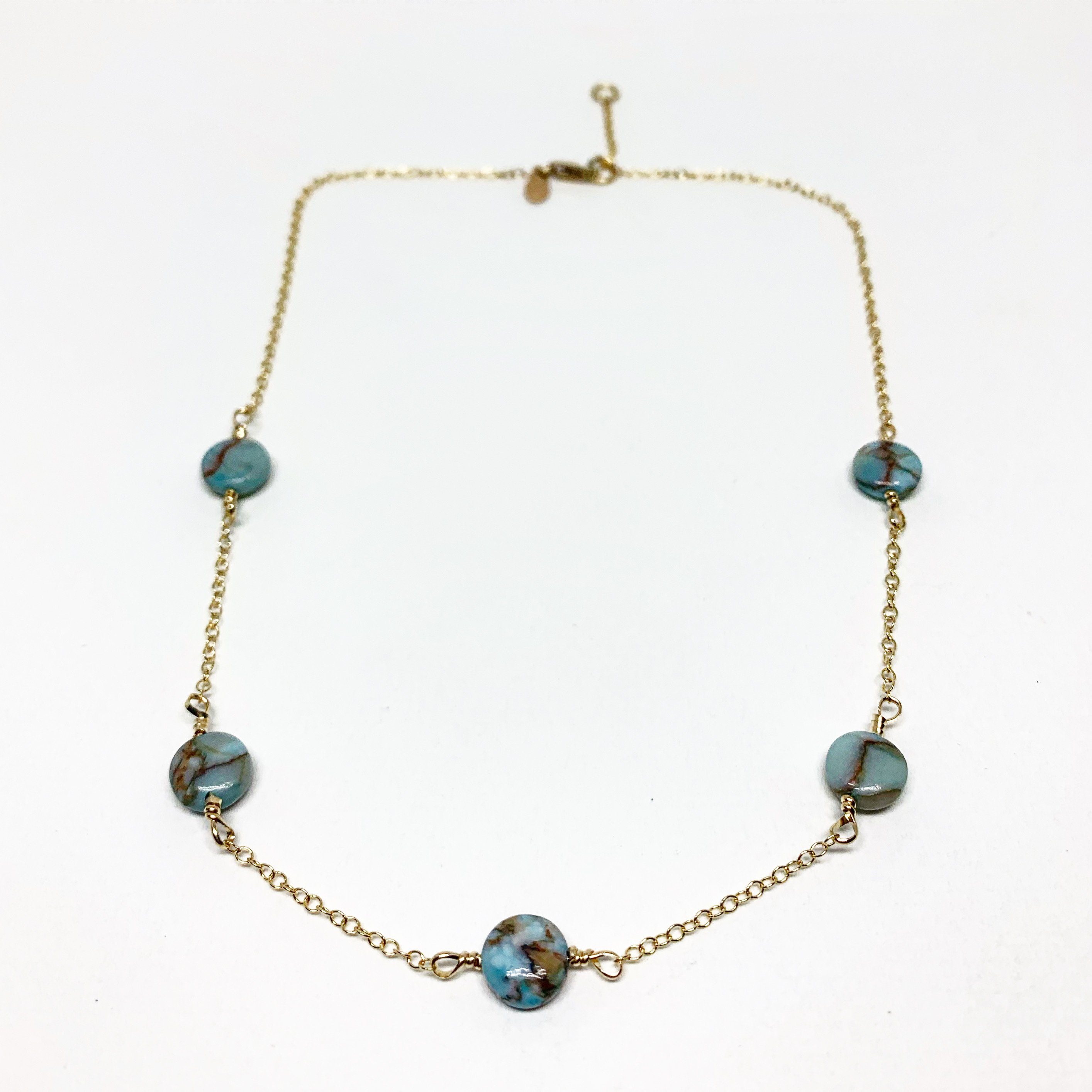 Turquoise Disc Choker Necklace featuring five 8mm turquoise round discs on a delicate chain, available in sterling silver or yellow gold fill.