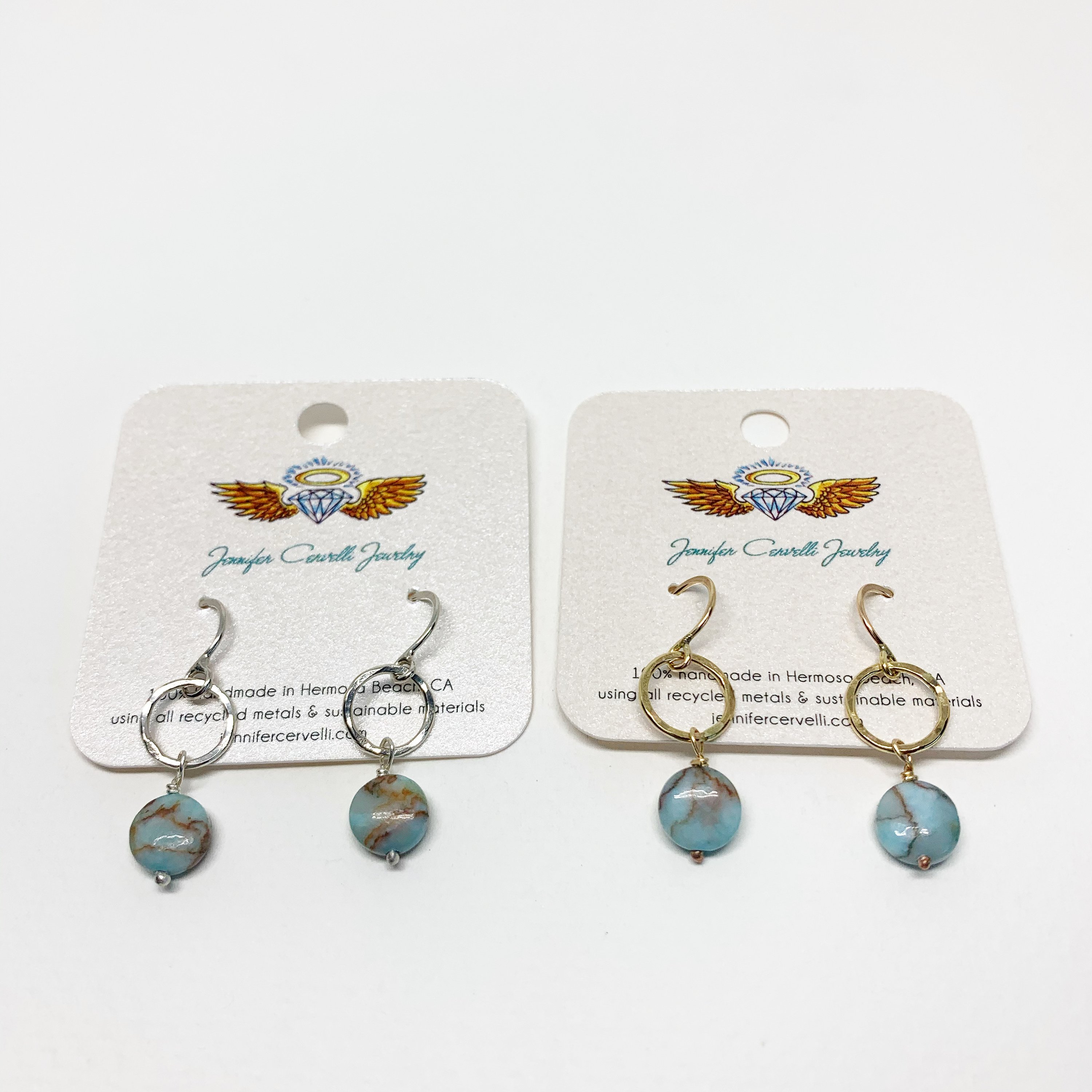 A pair of handmade turquoise disc drop earrings featuring 8mm blue turquoise round discs, hanging from a hammered circle in sterling silver or yellow gold fill.