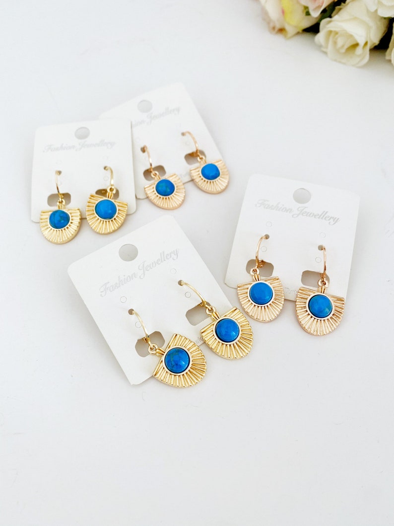 Handmade turquoise dangle earrings in gold and rose gold, showcasing a boho style perfect for women.