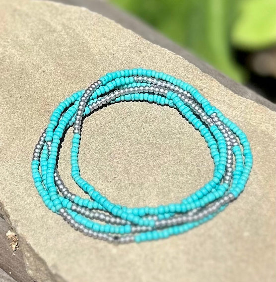 Turquoise silver-striped beaded 5-wrap bracelet showcasing vibrant Czech glass beads and metallic stripes.