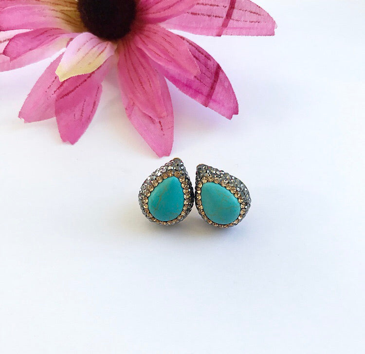 Elegant TURQUOISE Studs featuring turquoise stones and cubic zirconias in a pave setting, secured with butterfly backs.